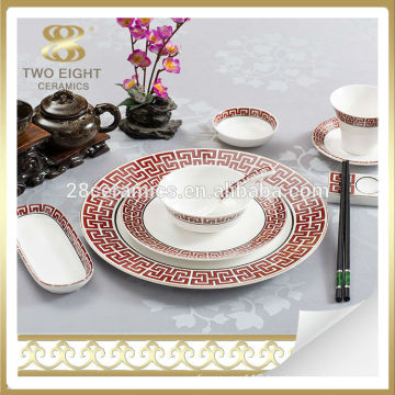 Japanese style red ceramic dinner table set stock
